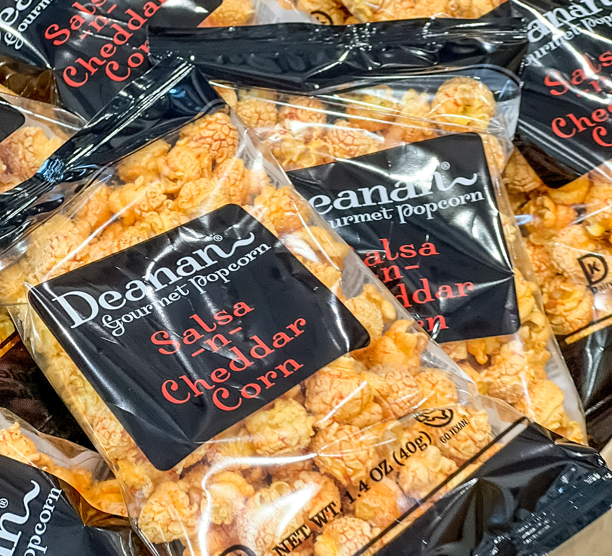Deanan Salsa N Cheddar Corn packaged and ready for shipping